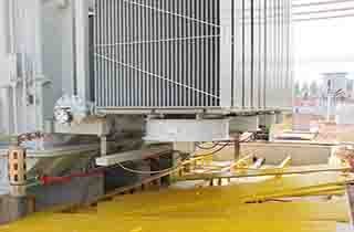 FRP grating panels and cable trench covers installed over outdoor power transformer substation basins.